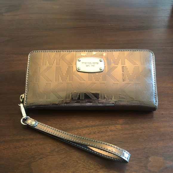 Michael Kors Handbags - Michael Kors Silver Metallic Wristlet Wallet